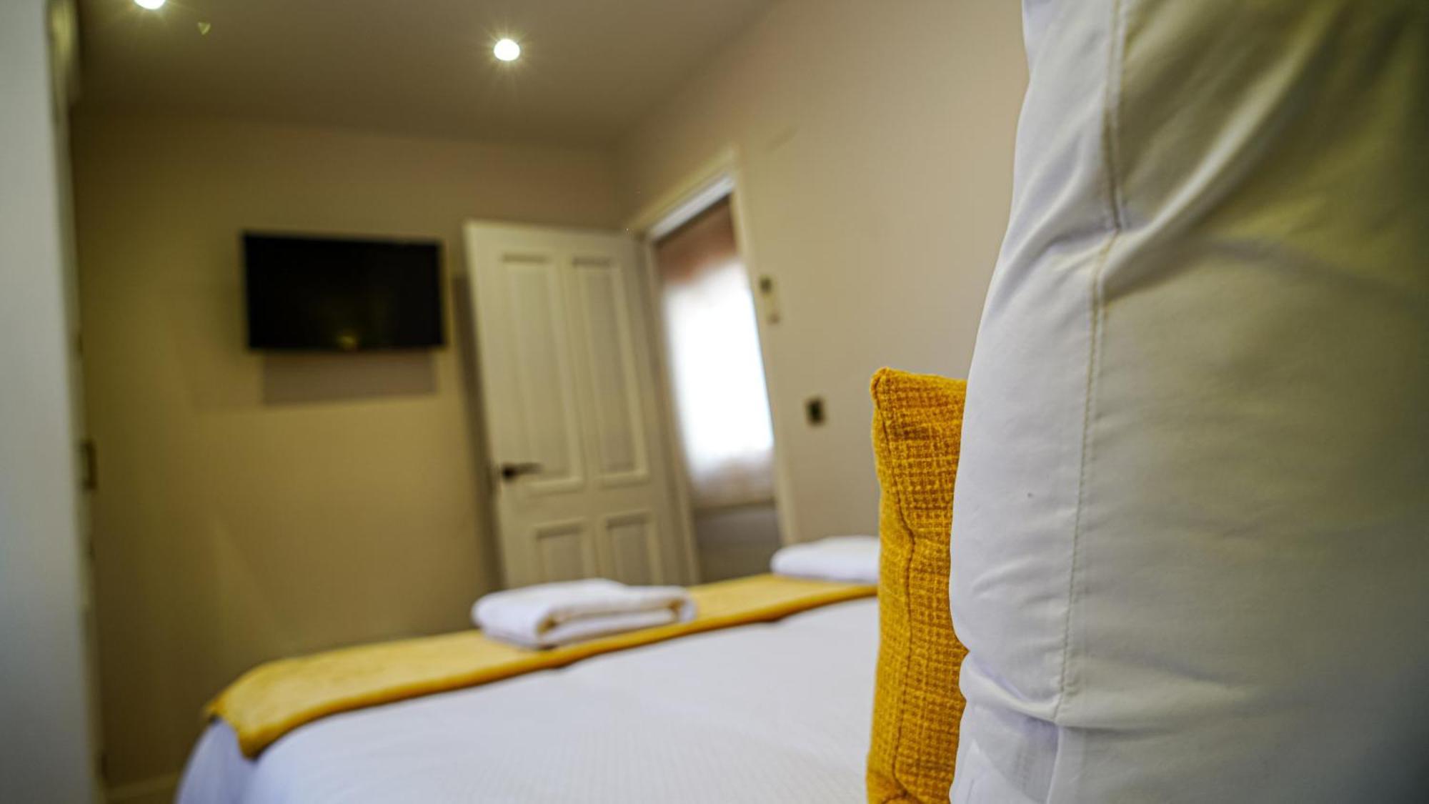 Apartamentos Puente Romano Suites Mérida Extérieur photo